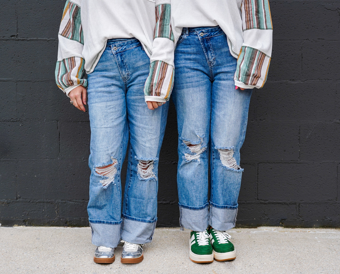 High-Rise Asymmetrical Button Ripped Jeans