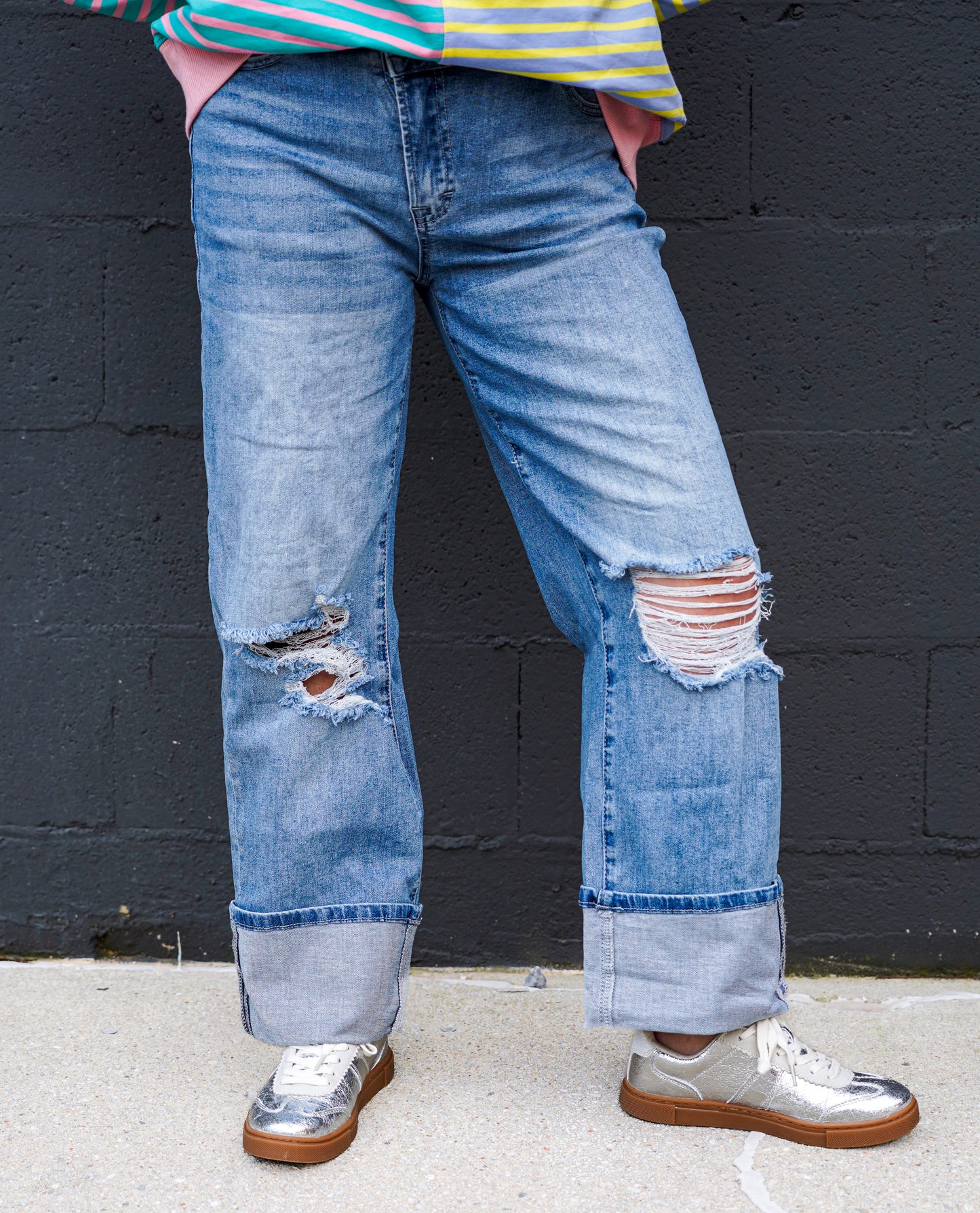High-Rise Asymmetrical Button Ripped Jeans